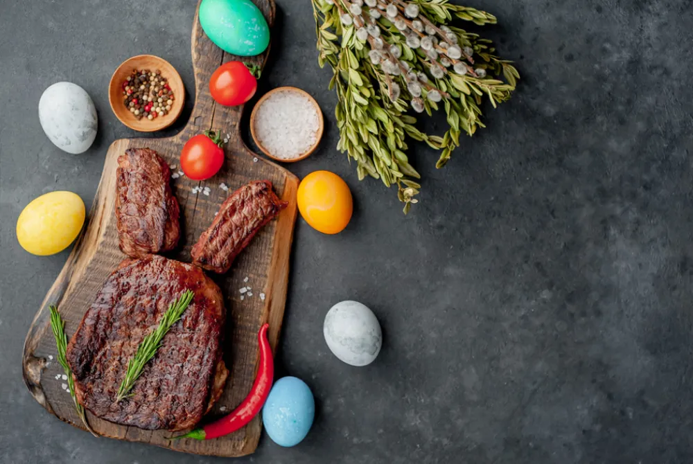 Easter meat | Selection of meat arranged like a bunny's head. With easter eggs arranged around it.