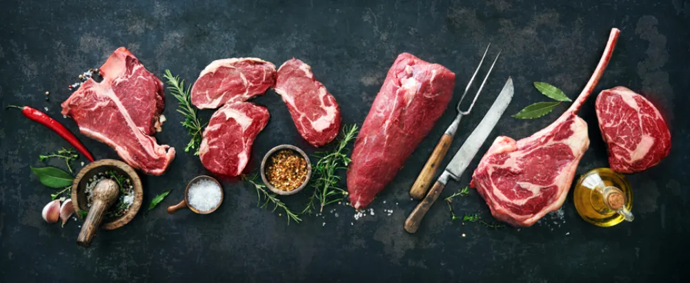 Steak cuts | Cuts of steak arranged on slate.